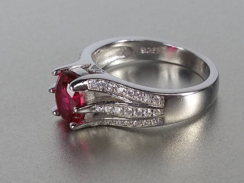 lot 81 image: Ruby and Diamond Ring