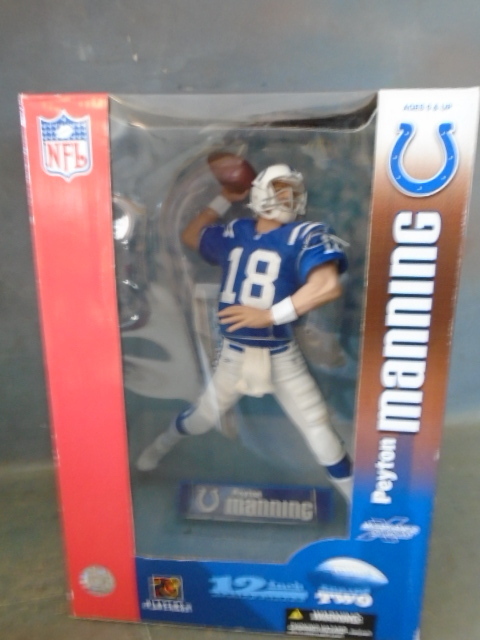 lot 56 image: Payton Manning Action Figure