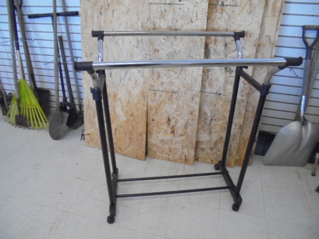 lot 74 image: Rolling Clothe Rack