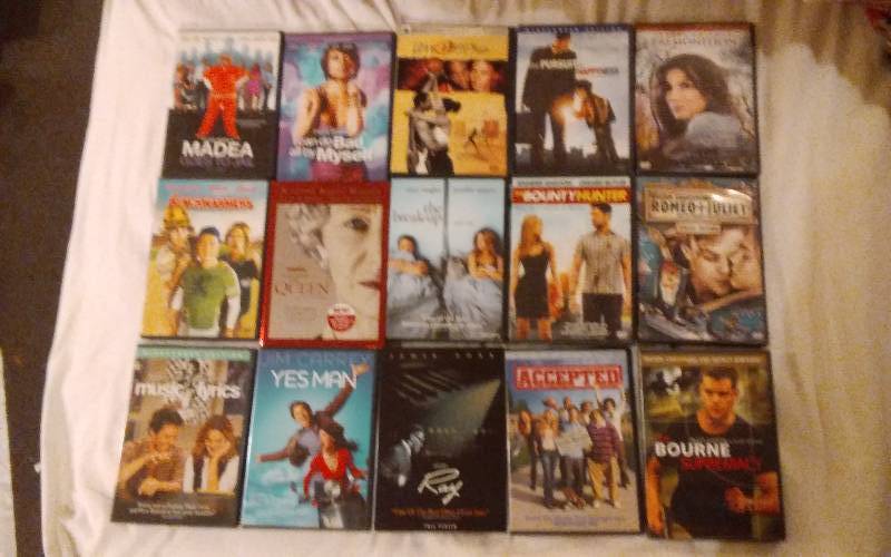 lot 12 image: 15 DVDs PG-13  Rated