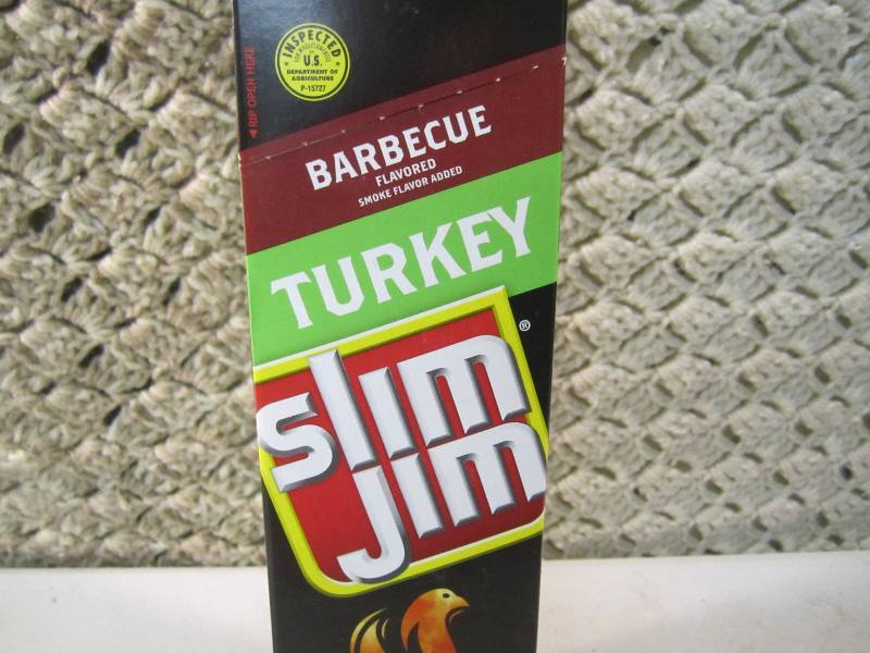 lot 62 image: Box of 24 Slim Jim Snack Sticks Bar...
