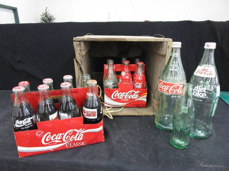 lot 52 image: Wood Box and Coke Bottles