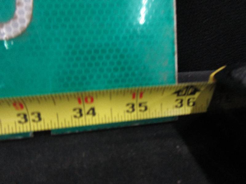 lot 53 image: Danger and Rug Shop Road Signs