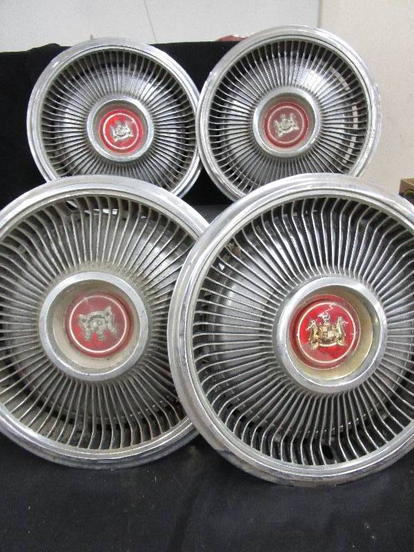 lot 128 image: 4 Matching Hubcaps
