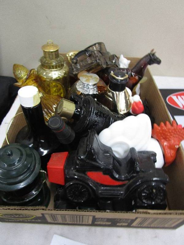 lot 129 image: Various Avon Bottles a few have Wild Country in them