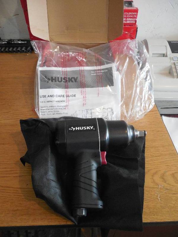 lot 11 image: Husky 12 in. 650 ft. lbs. Impact Wrench