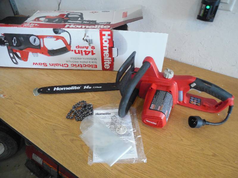 lot 5 image: Homelite 14 in. 9 Amp Electric Chainsaw
