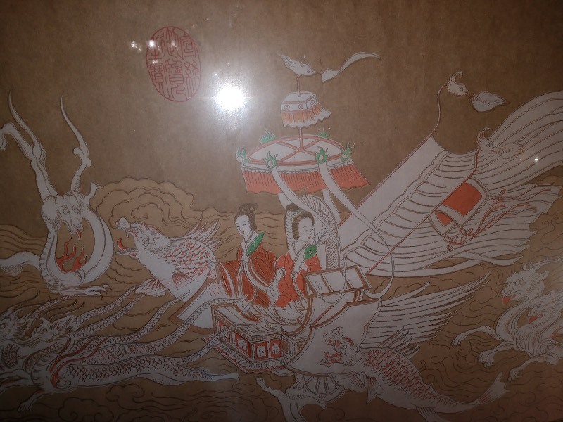 lot 20 image: Japanese Art Depicting Two Women in a Carriage and Dragons Framed