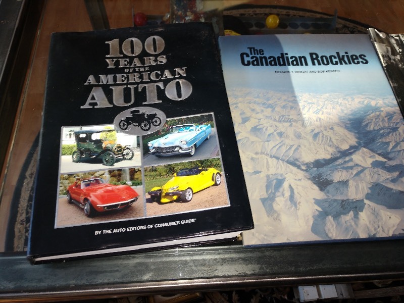 lot 24 image: 100 Years of the American Auto Book, The Canadian Rockies Book, LIFE Pearl Harbor Collectors Edition Magazine, Minnesota Twins Advertising Poster, The Smithsonian Experience Book