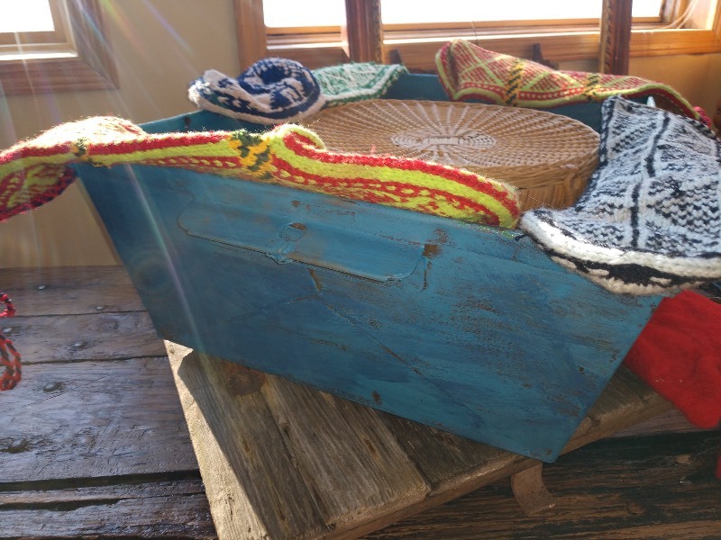 lot 81 image: Hand Knit Cotton Tribal Textiles and Rattan Basket
