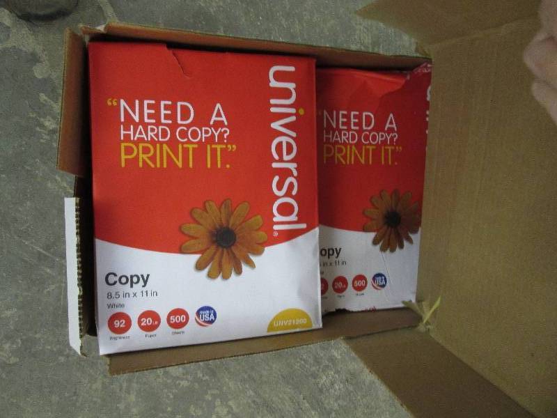 lot 25 image: Boxed 7 reams of Universal Copy Pap...