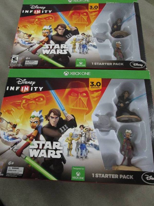 lot 179 image: Lot of 2 Disney Interactive Studios...