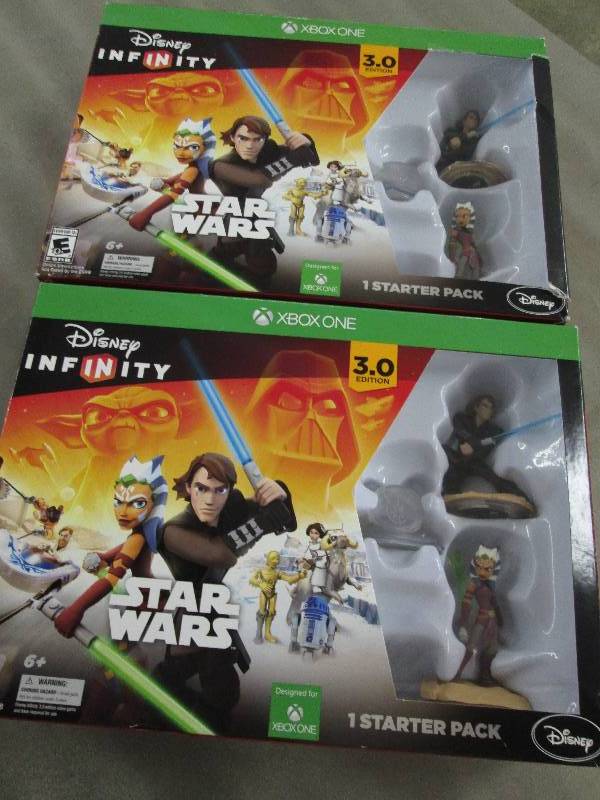 lot 180 image: Lot of 2 Disney Interactive Studios...