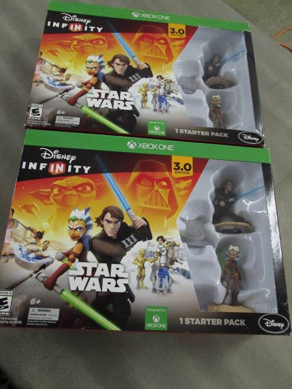 lot 183 image: Lot of 2 Disney Interactive Studios...