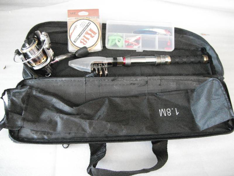 lot 87 image: Travel Fishing Rod & Reel