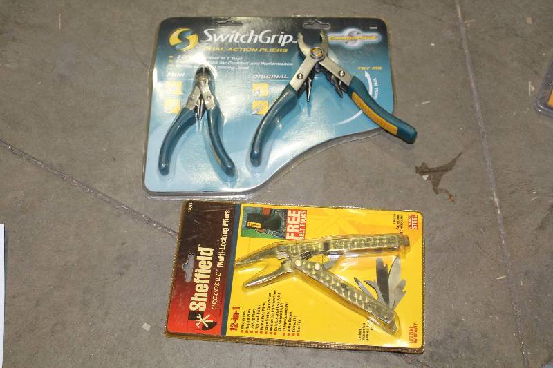 lot 103 image: Lot of (2) Hand Tools - Sheffield 12-in-1 Multi-Locking Pliers, SwitchGrip Dual Action Pliers