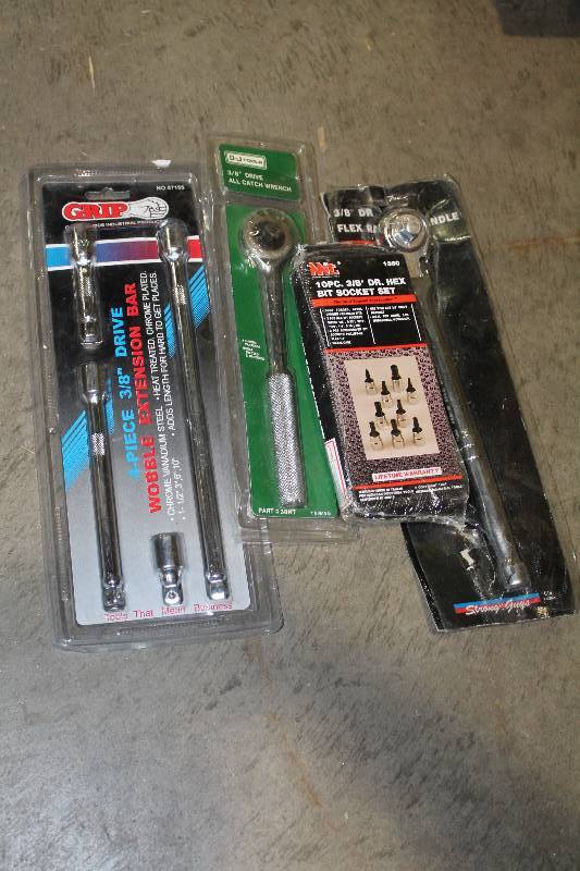 lot 151 image: Lot of (4) Hand Tools - 4-Piece 38in. Drive Wobble Extension Bar, DJ Tools 38in. Drive All Catch Wrench, MIT 10-Piece 38in. Drive Hex Bit Socket Set, 38in. Drive Flex Ratchet