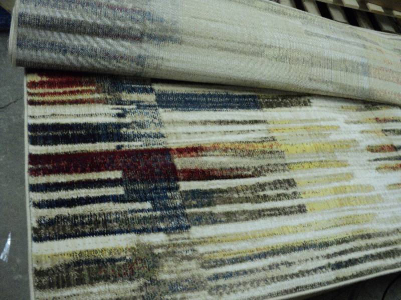 lot 39 image: area rug 7.10x10.2 feet...
