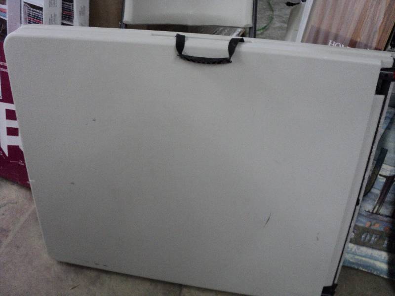 lot 48 image: 6 ft bifold table...