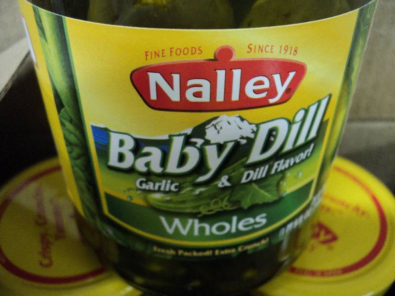lot 135 image: Case of 12 jars of Nalley Baby Dill...