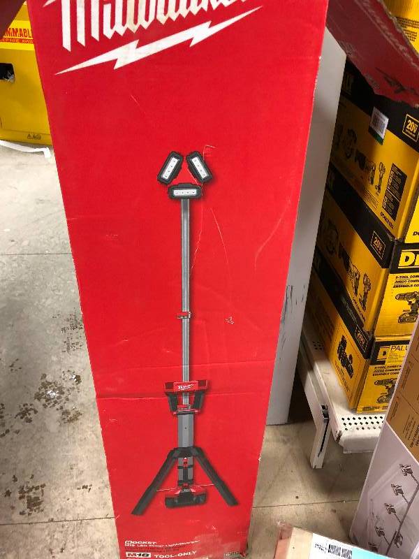 Milwaukee  M18 18-Volt Lithium-Ion Cordless 3000-Lumen ROCKET LED Stand Work Light & Charger (Tool-Only) in working condition