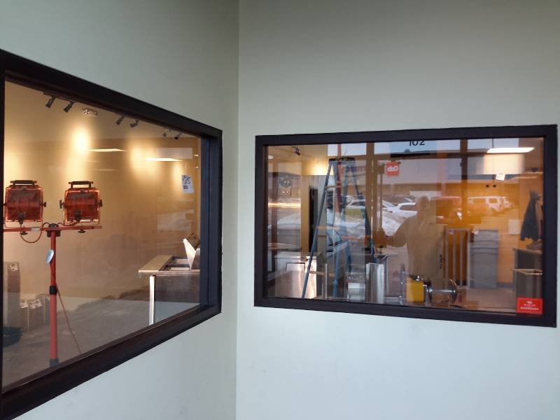 lot 65 image: 2, entry way windows.. Heavy Glass.. Not sure if shatterproof, but very nice