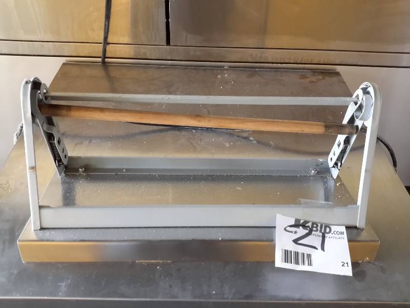 lot 21 image: Paper Roll holder Cutter.. 18 in