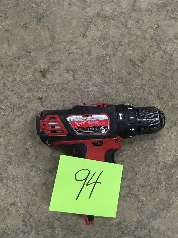 Milwaukee M12 2-Volt Cordless 38 in. Hammer DrillDriver ( Tool Only) used in working condition