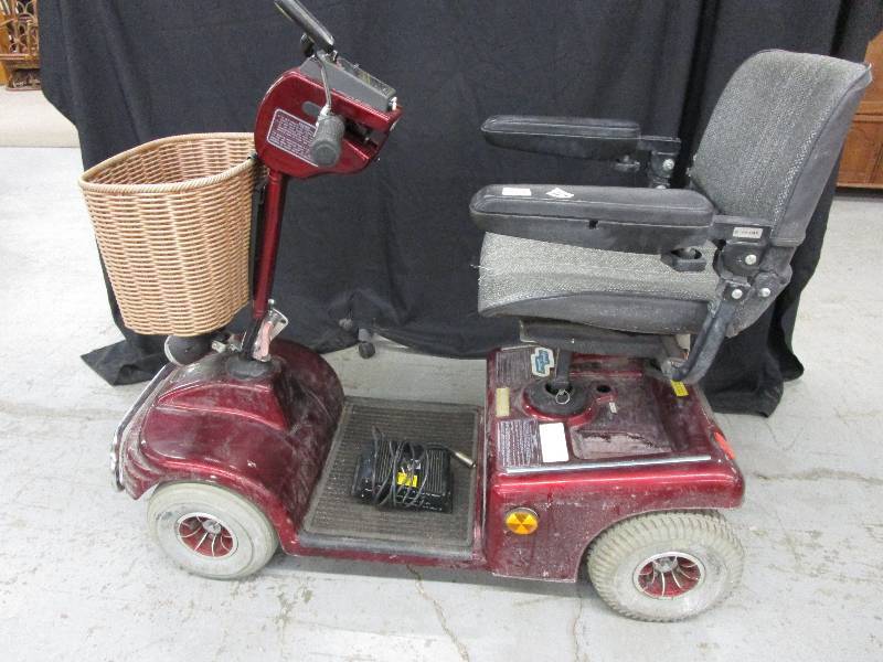 lot 54 image: Shop Rider Electric Scooter, Tested and Works and has the Charger