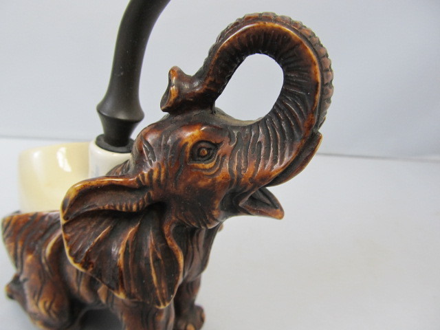lot 125 image: Vintage COMOY Elephant Pipe Holder wPipe