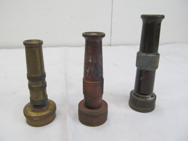 lot 93 image: Brass & Copper Hose Nozzles 