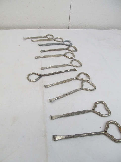 lot 121 image: Lot of Vintage Print Company Bottle Openers