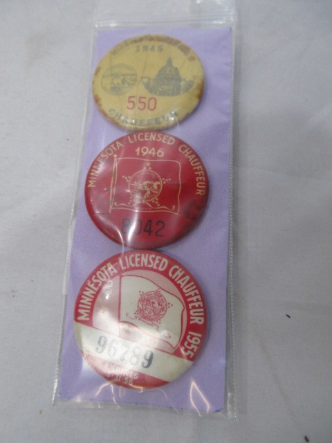 lot 127 image: 1945, 1946, 1955 MN Licensed Chauffeur Buttons