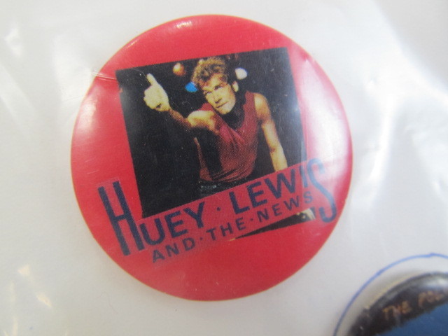lot 161 image: Vintage Music & Movie Pinbacks- Thelma & Louise, Huey & Lewis, etc