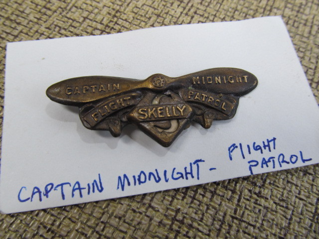 lot 202 image: Captain Midnight Flight Patrol Badge