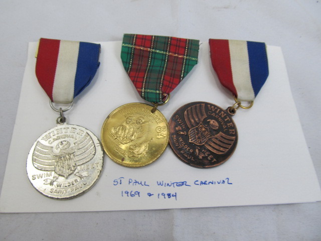 lot 215 image: 1969 & 1984 St Paul Winter Carnival Medals