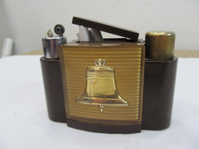 lot 255 image: Stanley Distributing Cigarette CaseLighter