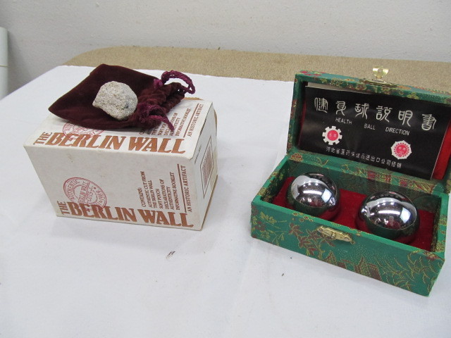lot 258 image: Authentic Piece of Berlin Wall & Set of Health Balls