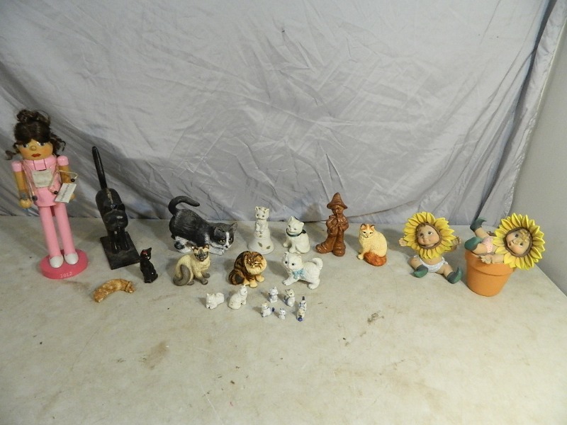 lot 47 image: Cats, Nurse Nutcracker, More