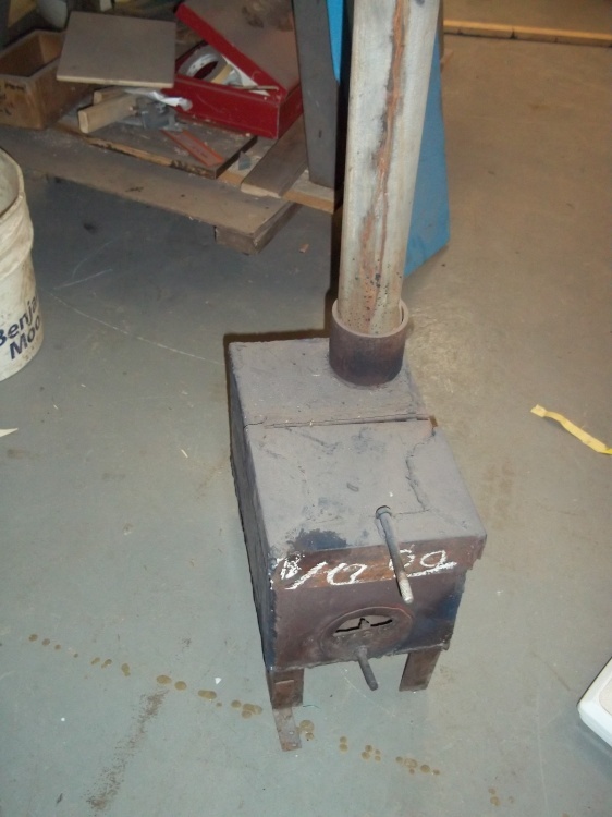lot 13 image: Ice House Stove Wood