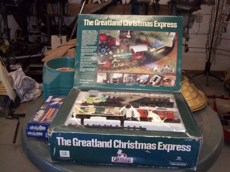 lot 90 image: Christmas Train with Christmas Dcor including tree stands