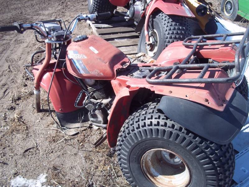 lot 105 image: Honda Three wheeler for parts or repair