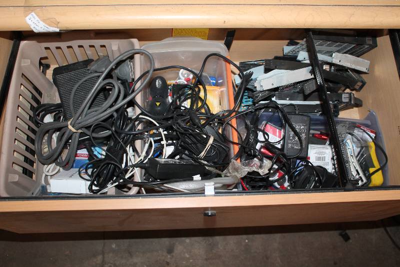 lot 110 image: Contents of Desk Drawers - Cords, Scanners, And More