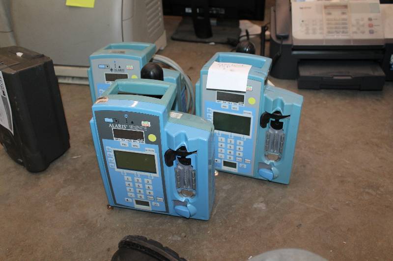 lot 26 image: Lot of (3) Alaris Medical Systems Signature Edition Gold Volumetric Infusion Pumps