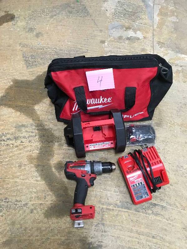 lot 4 image: Milwaukee M18 18-Volt 12in. Hammer DrillDriver Kit used in good working condition