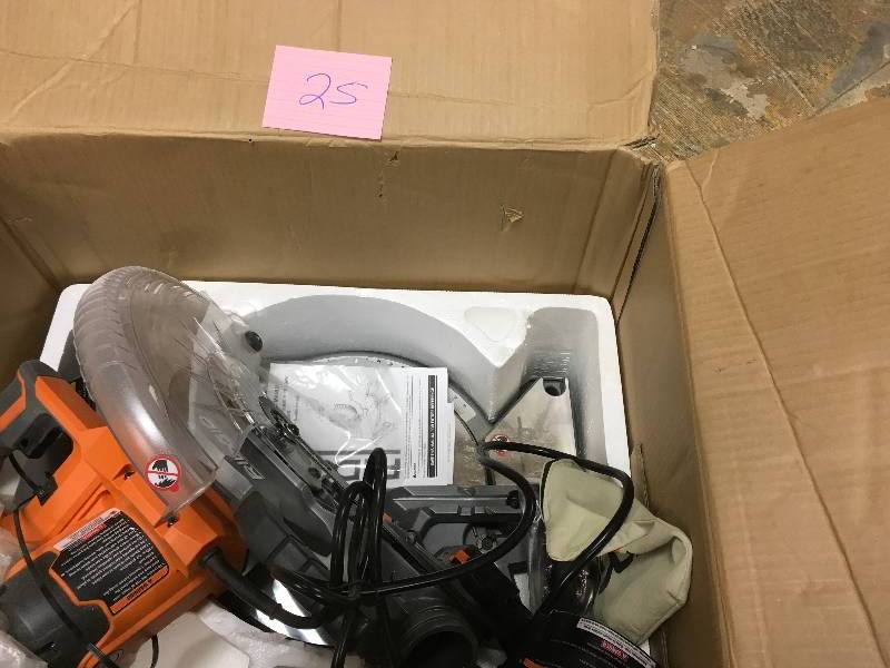 lot 25 image: Ridgid 15 Amp 10 in. Dual Bevel Miter Saw with Laser used in good working condition