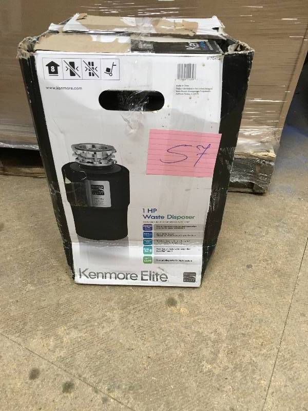 lot 57 image: Frigidare Company Kenmore Elite 70413 1 Horsepower Delux Garbage Disposer