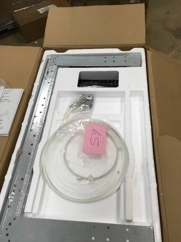 lot 59 image: Magic Chef 1.6 cu, ft. Over the Range Microwave in Black not used