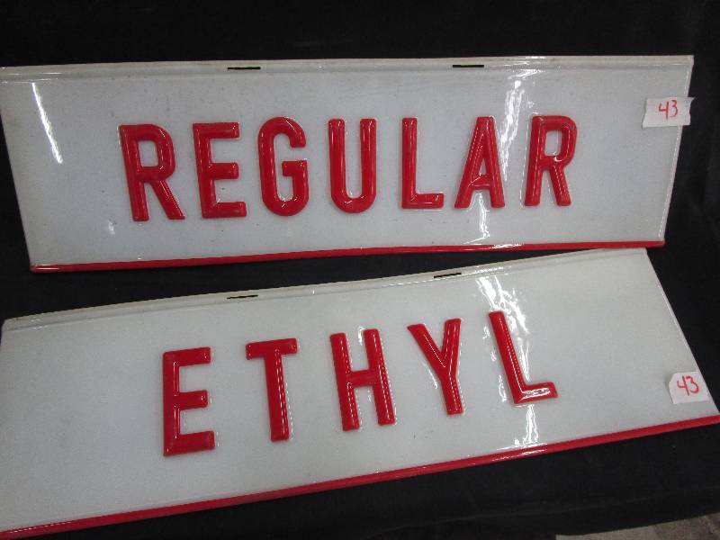 lot 43 image: Regular and Ethyl Plastic Gas Label Signs