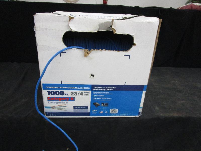 lot 81 image: Cat 6 Cable 1000 Foot Box not sure how much is been used